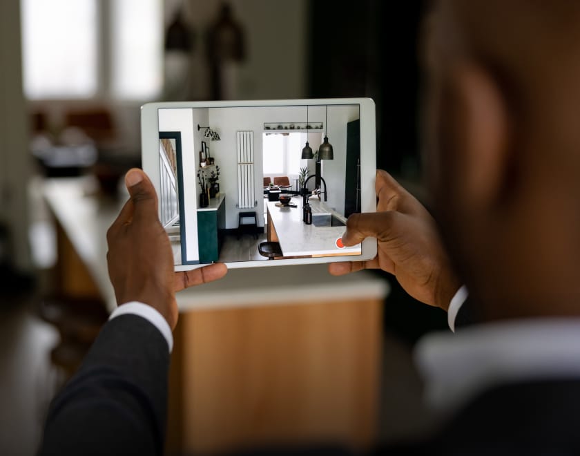 looking at house listing on tablet